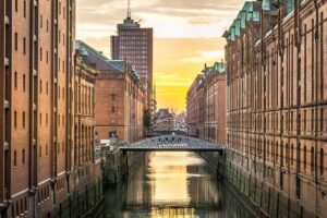 hamburg, speicherstadt, channel, warehouse, germany, architecture, waterway, bridge, sunset, river, mirroring, nature, afterglow