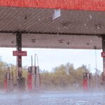 A gas station in Dallgow-Döberitz, Germany, during a rainy day. Winterdiesel Wohnmobil an der Tankstelle bei Frost