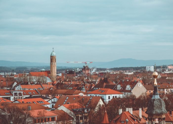 pexels-photo-3489009-3489009 Explore the charming red rooftops of historic Bamberg under a cloudy sky. A scenic blend of architecture and culture.
