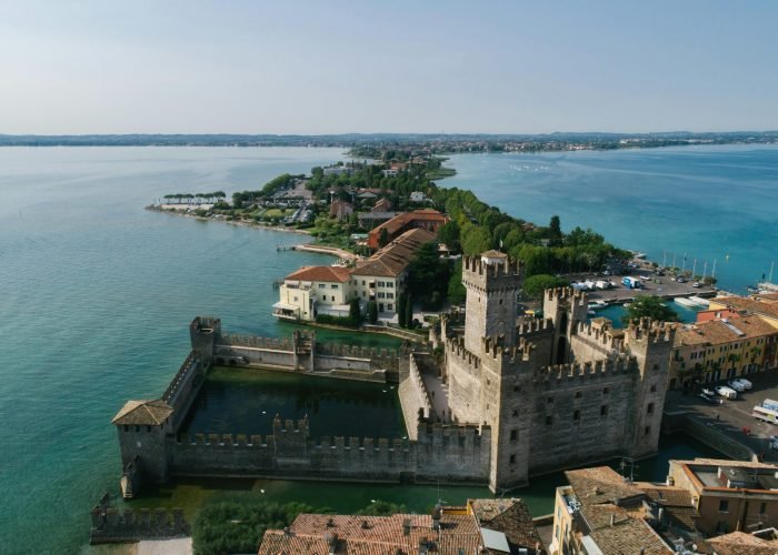 Aerial view of Scaligero Castle and Sirmione peninsula on Lake Garda, Italy. Aerial view of Scaligero Castle and Sirmione peninsula on Lake Garda, Italy.